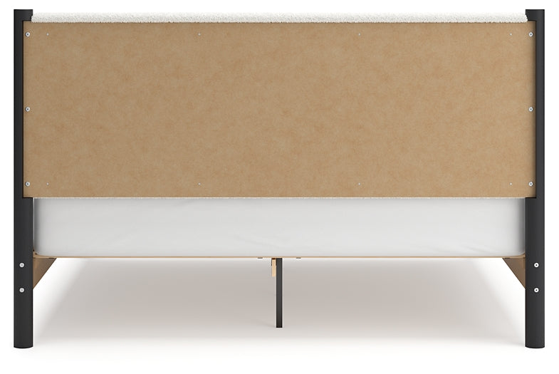 Cadmori King Upholstered Panel Bed with Dresser
